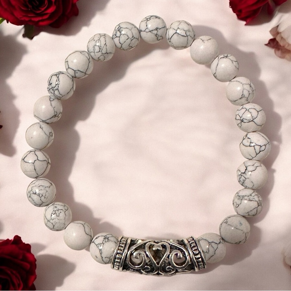Elegant White Beaded Bracelet with Silver Accents